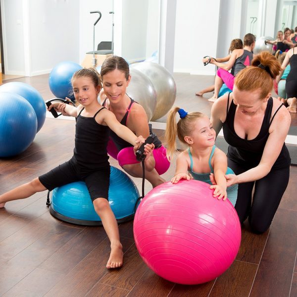 Aerobics pilates women kid girls personal trainer instructors at gym